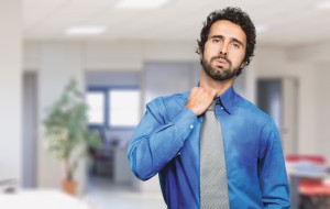 Sweating businessman due to hot climate