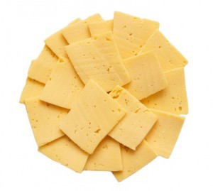 sliced ​​cheese on white background